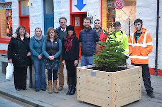 Photo left to right: Christena Irvine (Manager at Living Lerwick), Dawn Siegel (N-Graved Shetland), Caroline Carroll (Harry’s), Steve Mathieson (Vice Chair, Living Lerwick), Cynthia Adamson (Chair, Living Lerwick), Stewart Jamieson (Harry’s), Ryan Jamieson (Support worker, Bridges Project), Asa Tulloch (Bridges student) and William White (Bridges student).